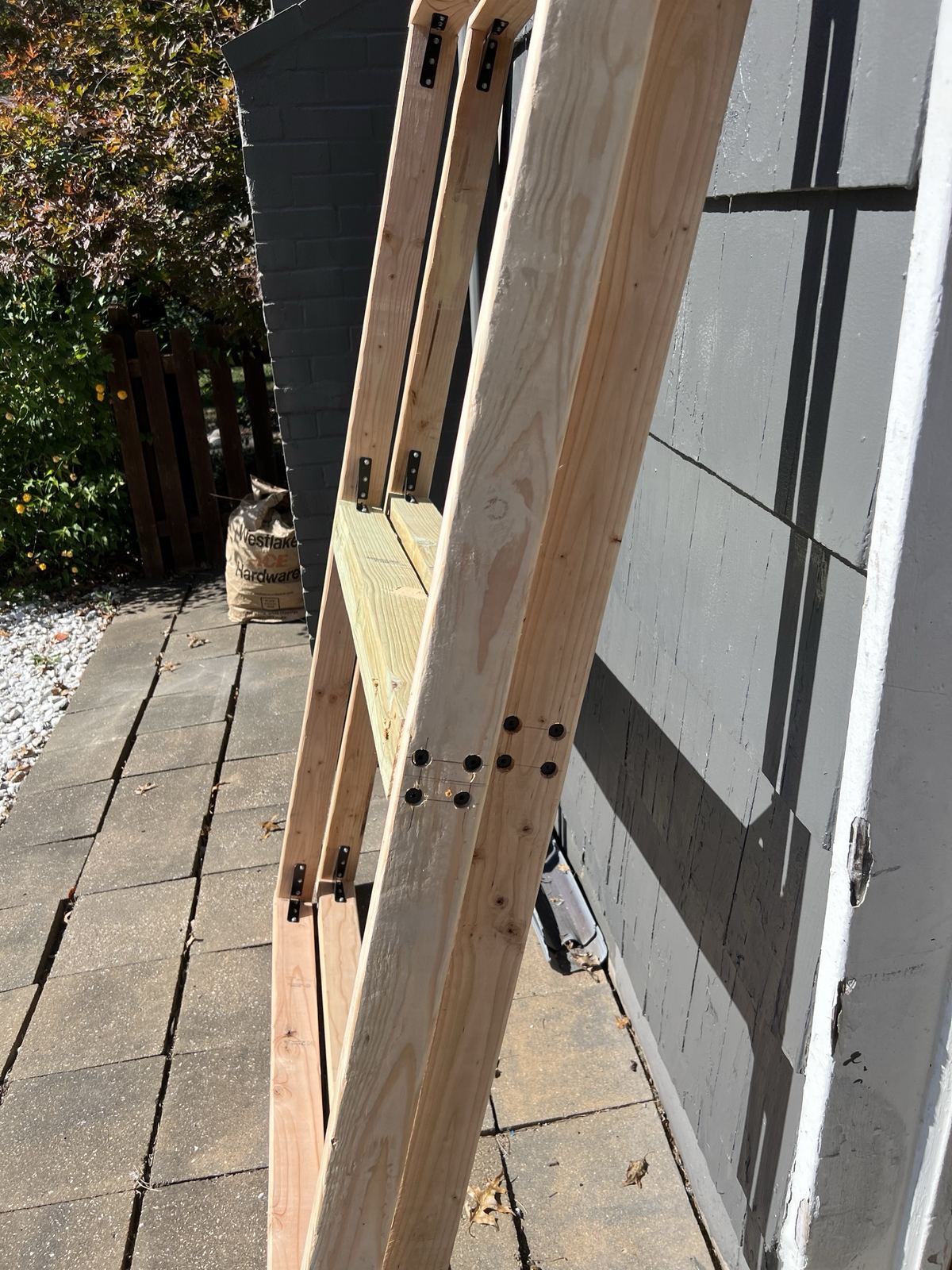 Side view of the frame showing its steel-braced corners